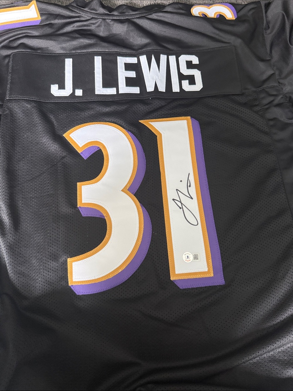 Signed J. Lewis #31 Black Football Jersey with Purple & Gold Trim